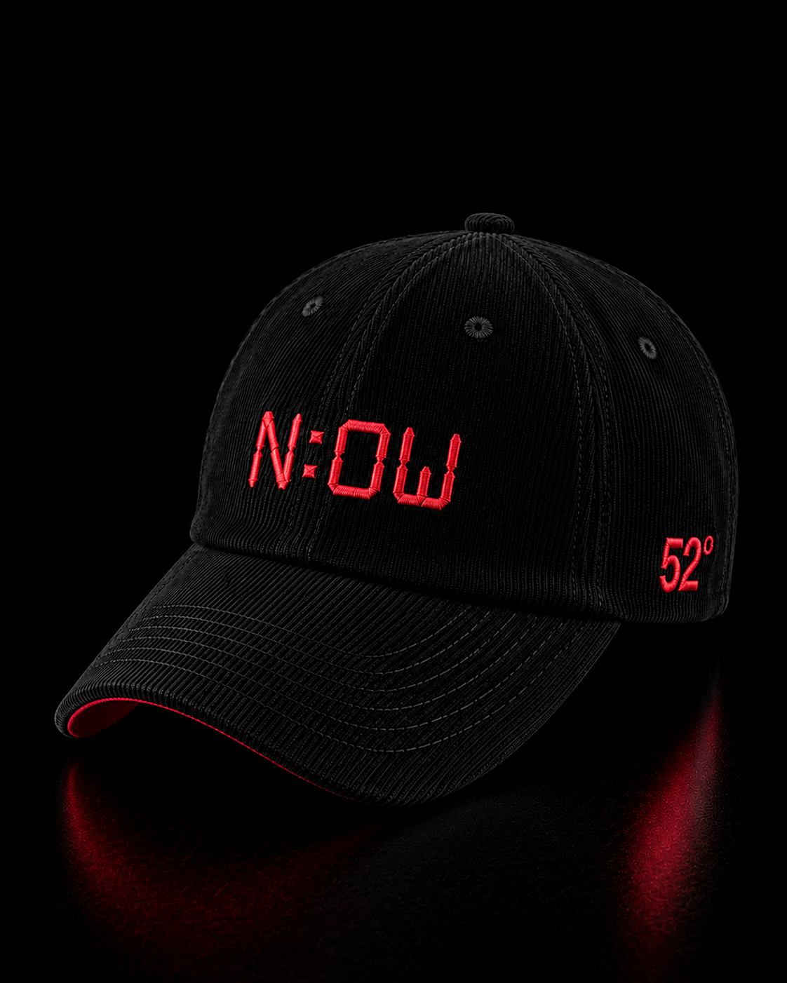 Black cap with red LED NOW text on a black background
