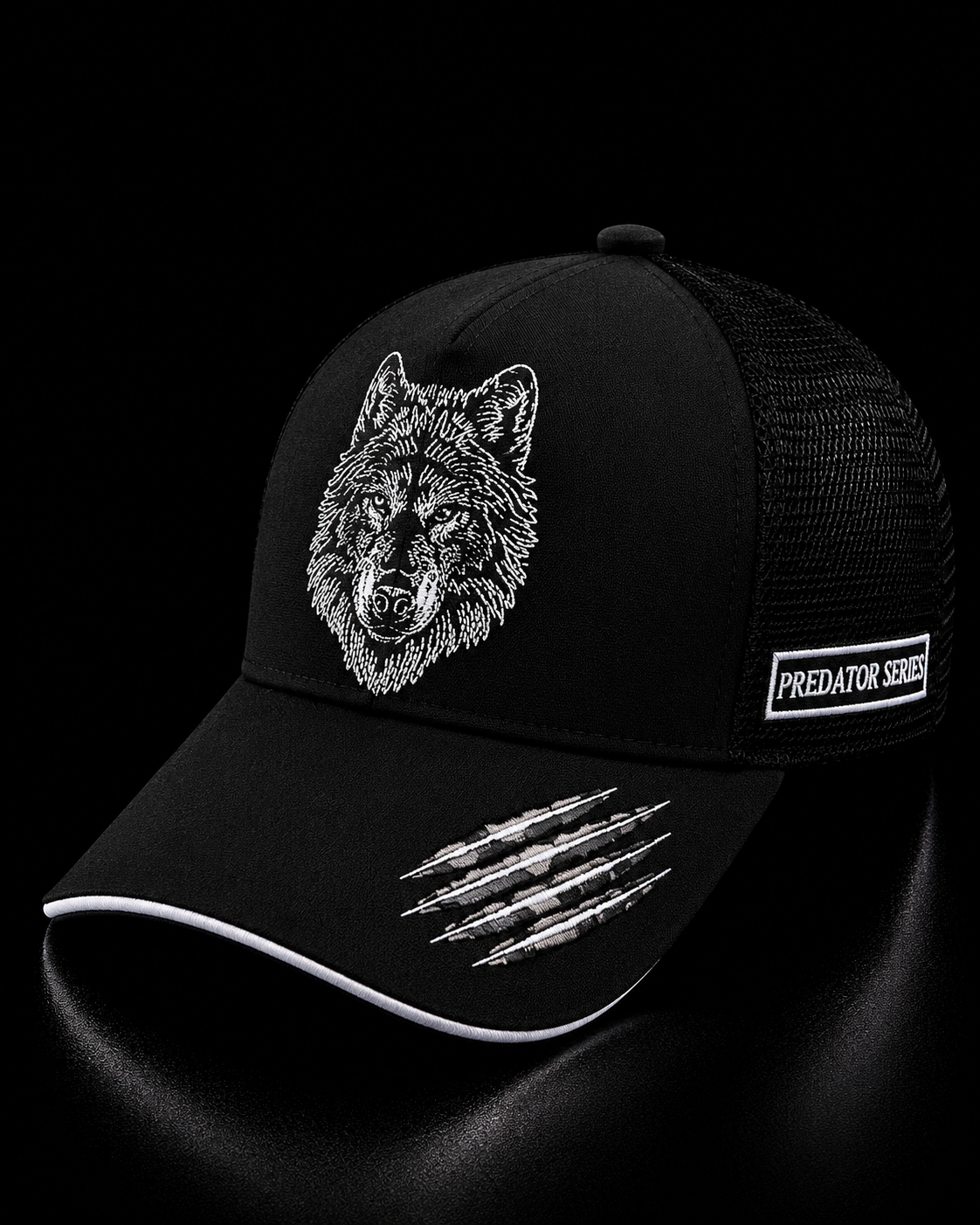 Black cap with wolf design and 'Predator Series' label on a dark background
