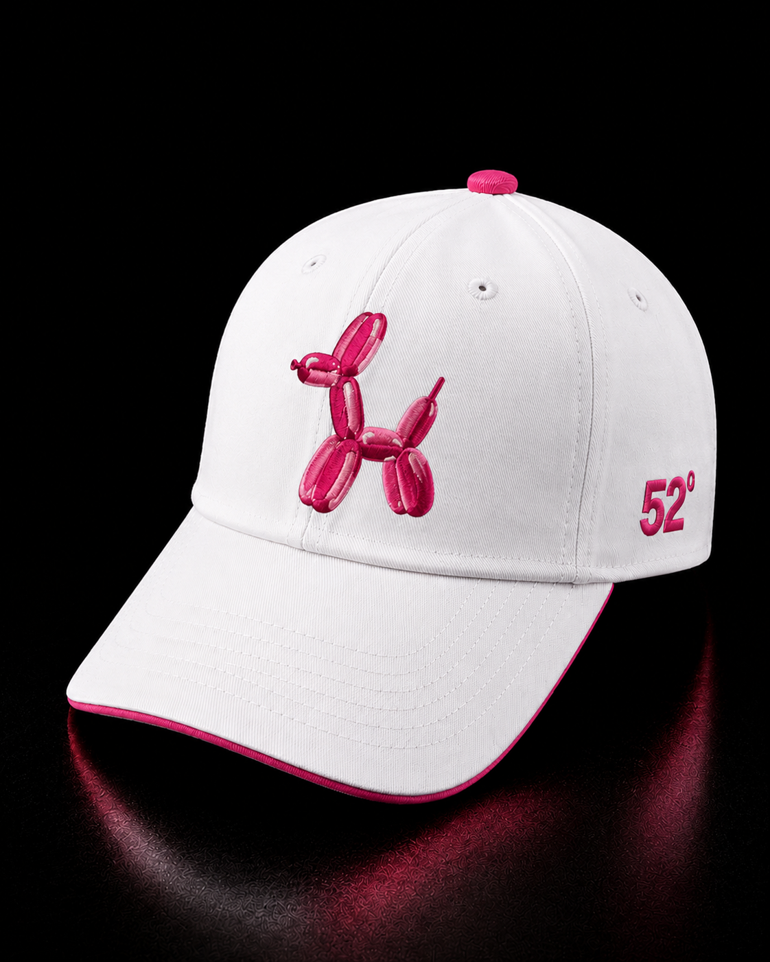 White cap with pink accents featuring a balloon dog design and number 52 on a black background