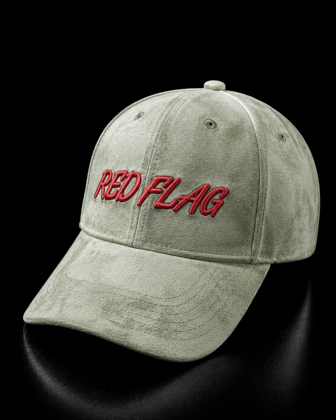 Green cap with 'RED FLAG' in red text on a black background