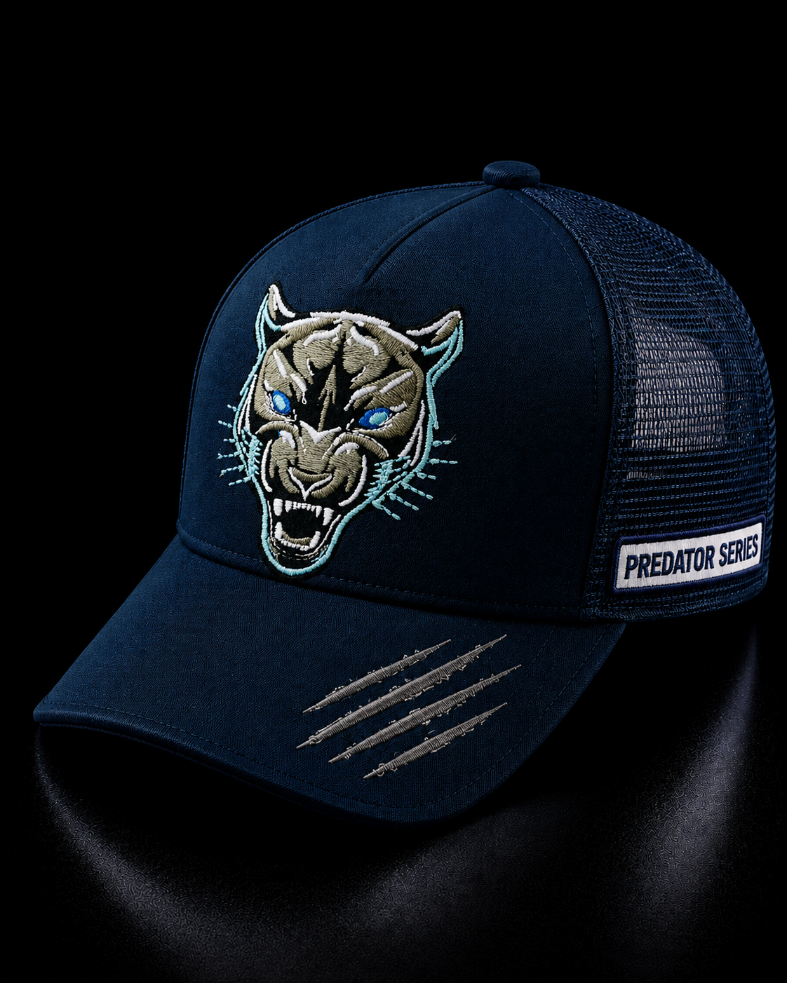 Navy blue cap with a predator logo on a black background