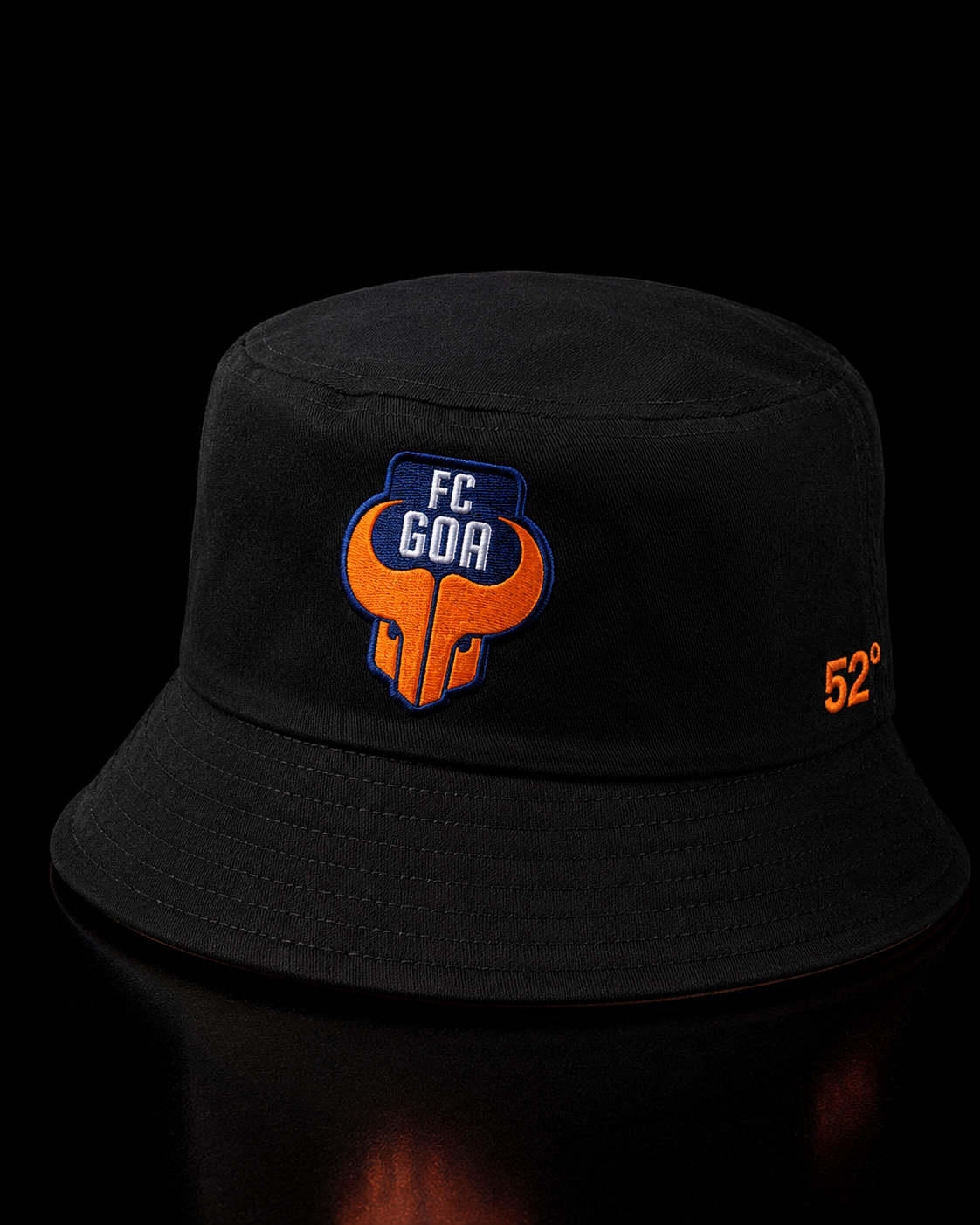 Black bucket hat with FC Goa logo on a black background